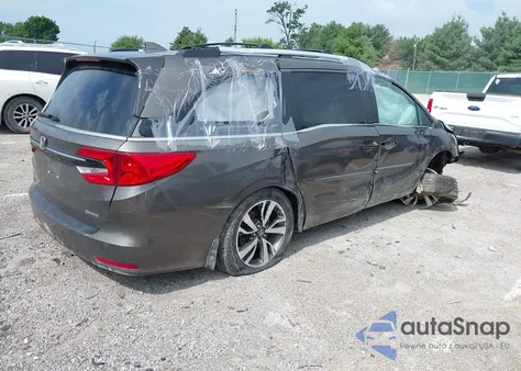 2021 Honda Odyssey Touring z USA, uszkodzony, nr VIN 5FNRL6H84MB002272